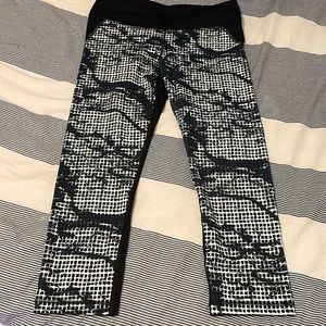 UA Medium Black with a white print in EUC
